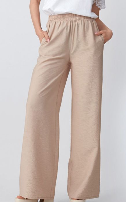 Beżowe letnie spodnie z szerokimi nogawkami 40/42 L/XL