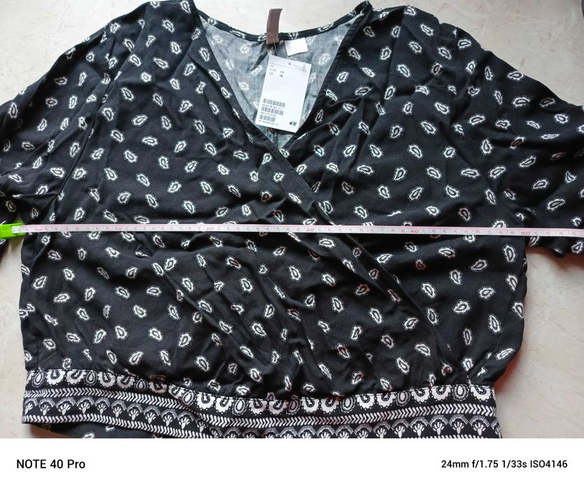 Bluzka dekolt kopertowy.