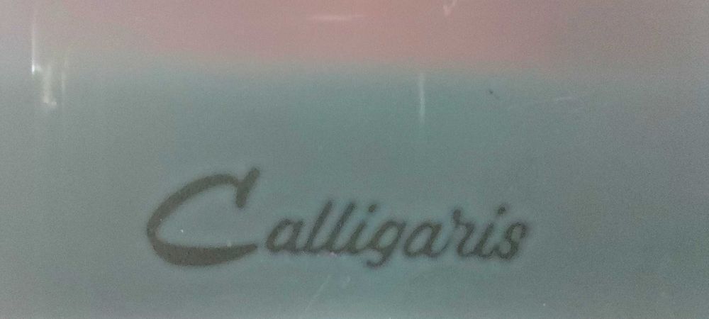 Mesa com tampo em vidro e 6 cadeira, do desenhador italiano Calligaris