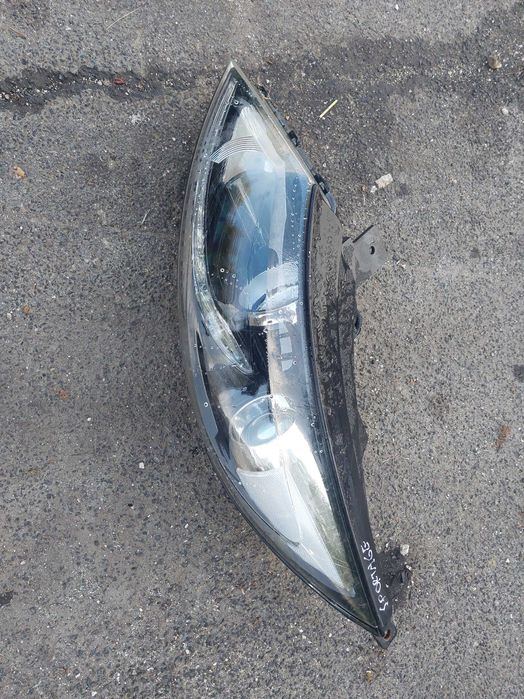 Lampa lewa przod xenon kia sportage 3 2015r 92101--3u310  anglik
