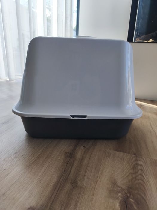 Cama e caixa de areia para gatos