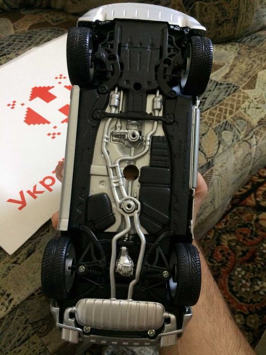 модель Порше 1 18 та комбайн CLAAS (виробник SIKU)