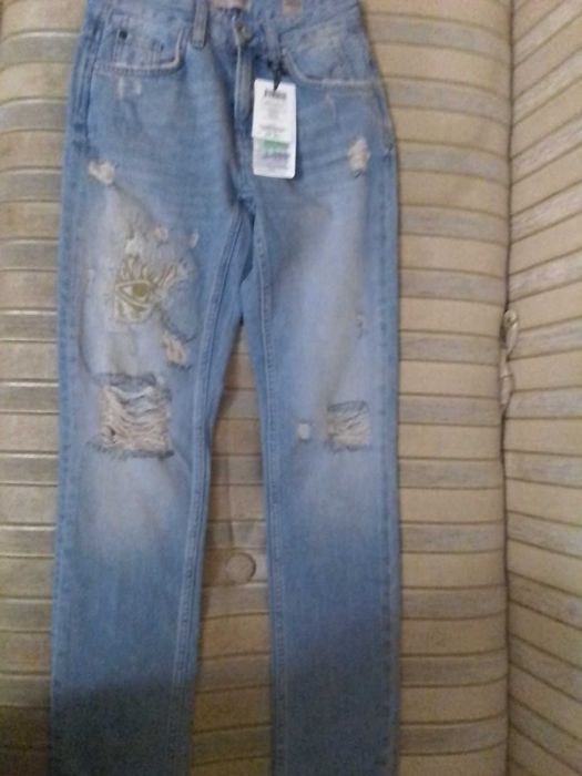 Джинсы женские Colin's голубые.