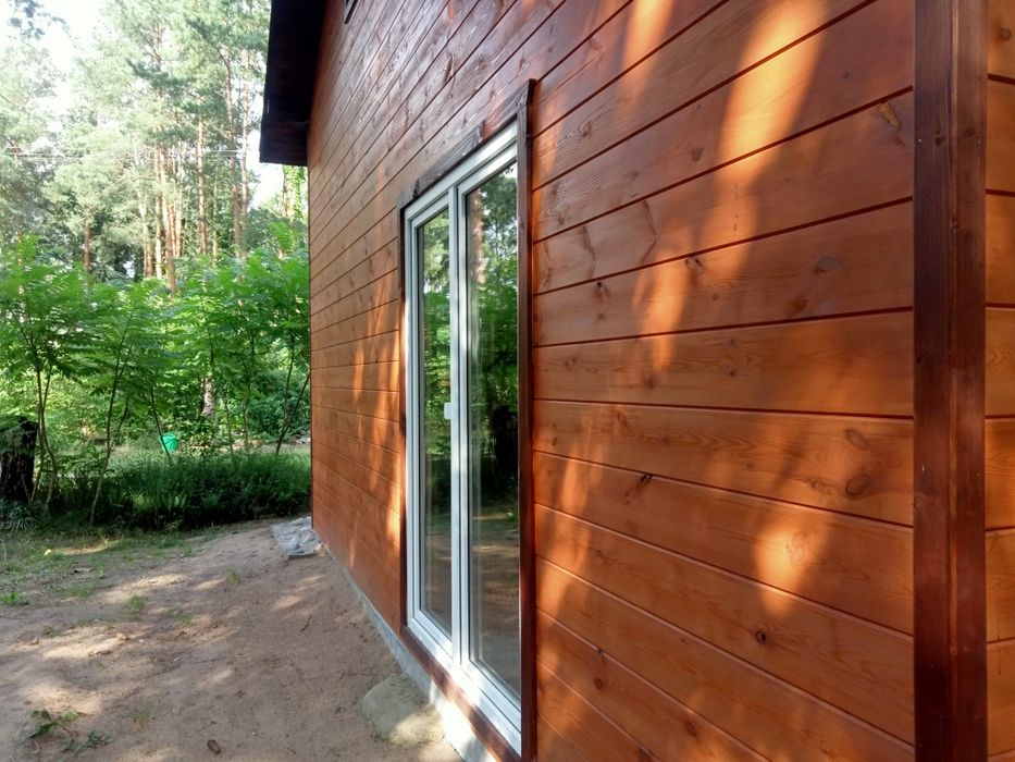 Sprzedam działkę z nowym całorocznym domkiem