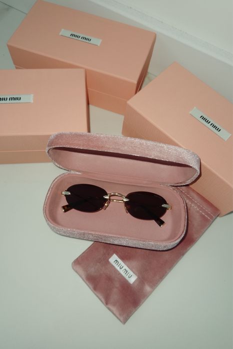 Окуляри MIU MIU