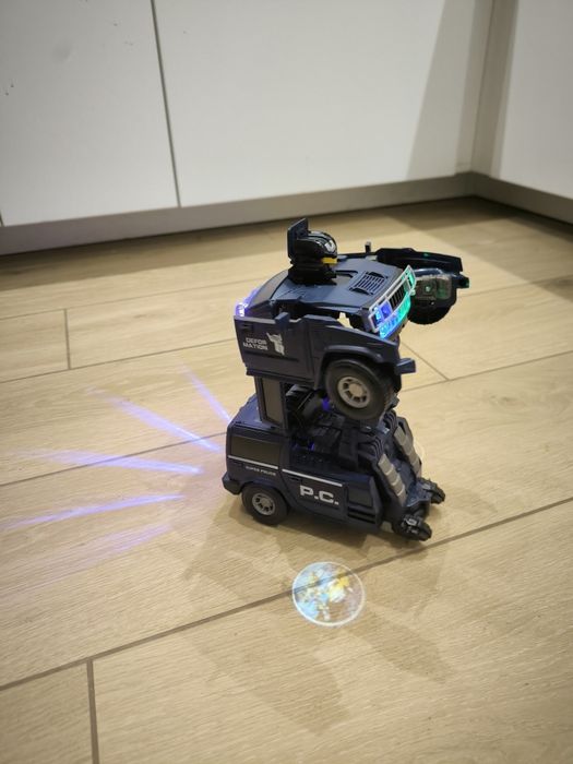 Prezent święta NOWY. Mikołaj Interaktywny pojazd policyjny policja dla dzieci Transformers świeci