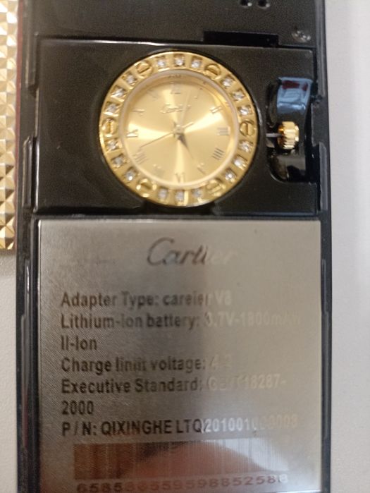 Телефон фирмы Cartier