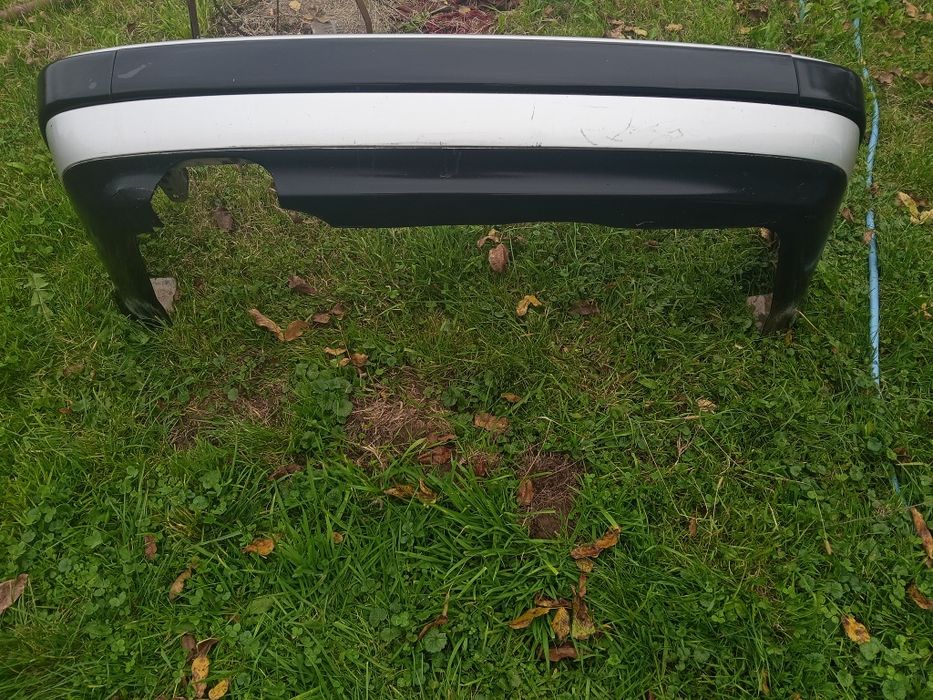 Бампер задній на Ауді А6 С4.