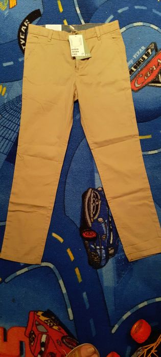 Spodnie rozm. 134 HM nowe