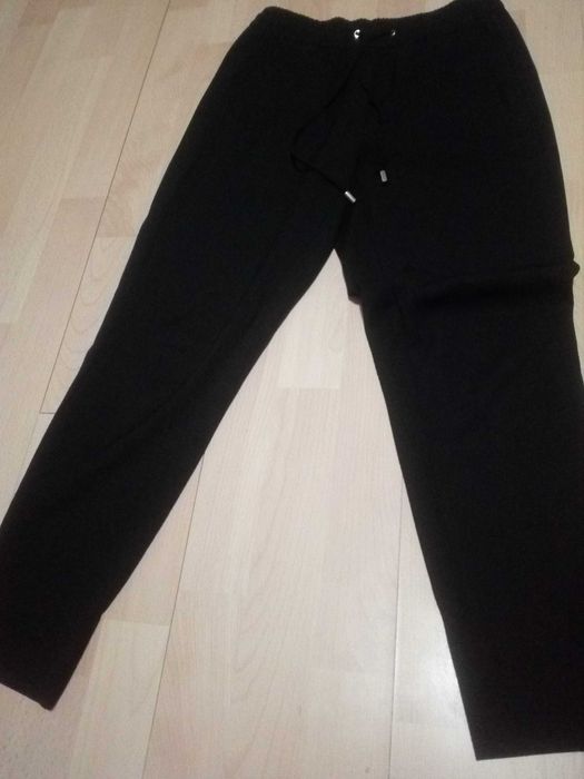 Czarne spodnie damskie H&m