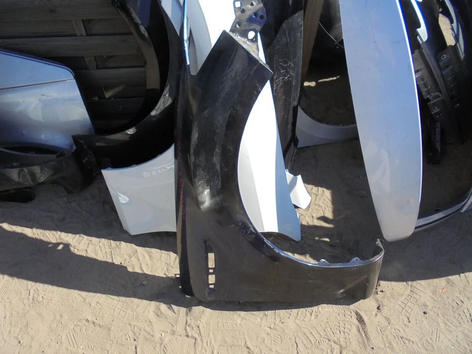 FORD MONDEO MK4 BŁOTNIK PRAWY PRZÓD