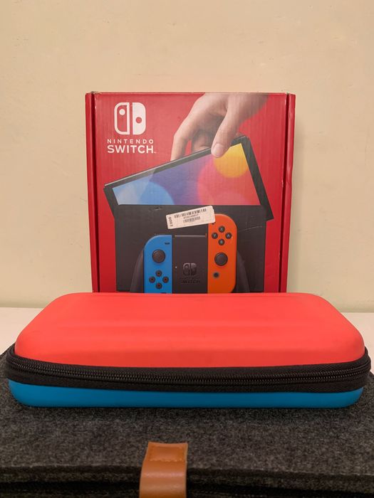 Nintendo Switch OLED + Comando Subsonic + Jogos + Estojo de Transporte (Como Nova)