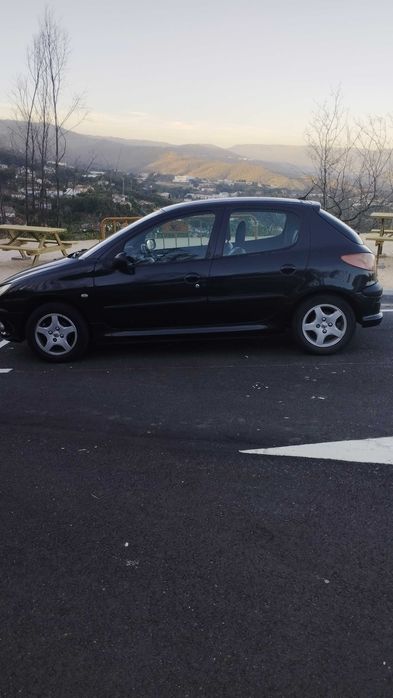 Peugeot 206 1.4 HDI Completo baixei pra vender logo.