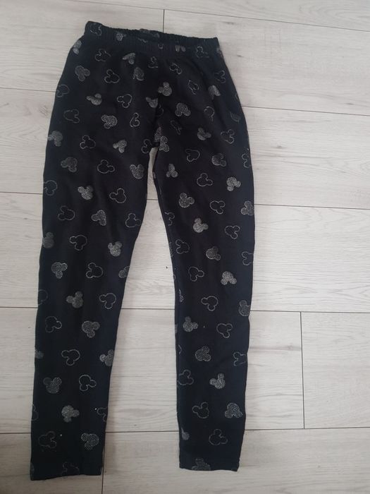 Spodnie leginsy  dziewczęce roz 158 czarne w kształty micky brokatowe
