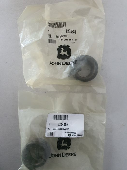 L204229/L204230-Sprężyna błotnika John Deere