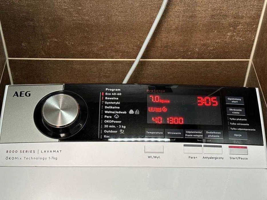 Вертикальна пральна машина AEG seria 8000 LTN8C373 Доставлю!