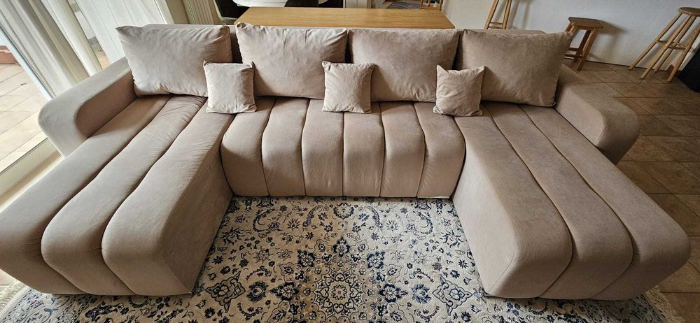 Sofá cama em U em bom estado de conservação