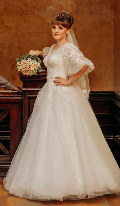 Весільна сукня .