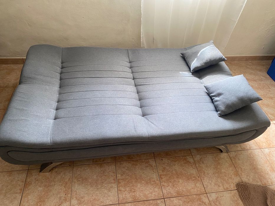 Sofá de sala de estar com cama
