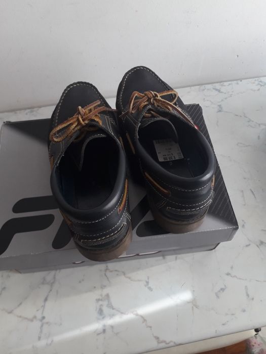 Sapatos usados em bom estado