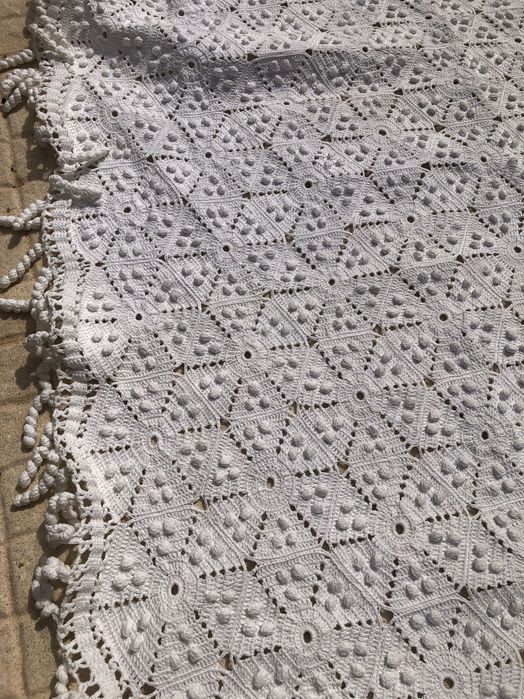 Colcha de renda feita à mão