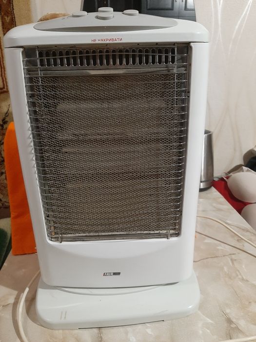 Электрообогреватель галогеновый б/у .