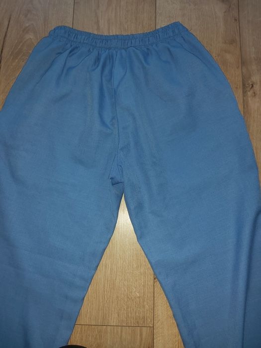 Szerokie materiałowe spodnie, niebieskie rozm M/L