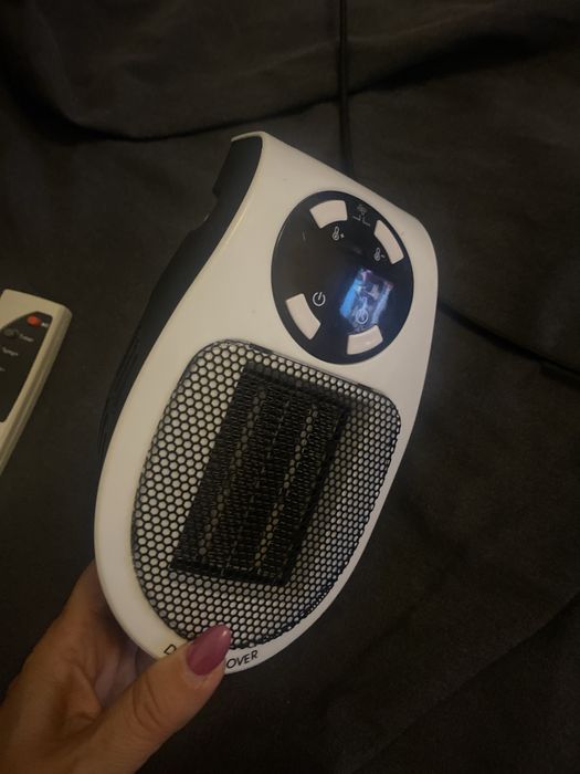 Aquecedor de tomada com comando