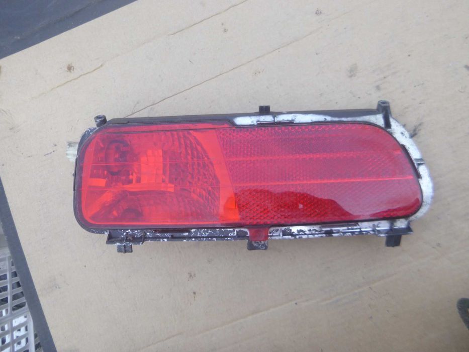 Citroen C4 Picasso I lampa zderzaka lewy tył 965.354.8780