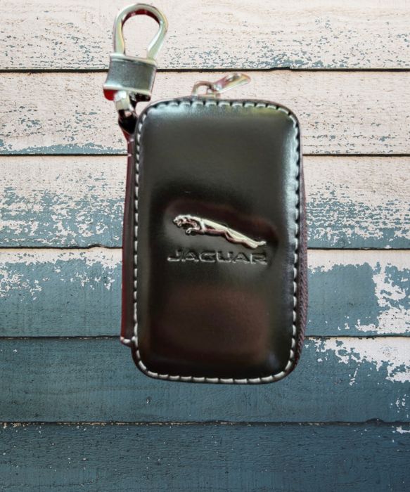 Jaguar- carteira, porta chaves. Novo. Excelente oportunidade
