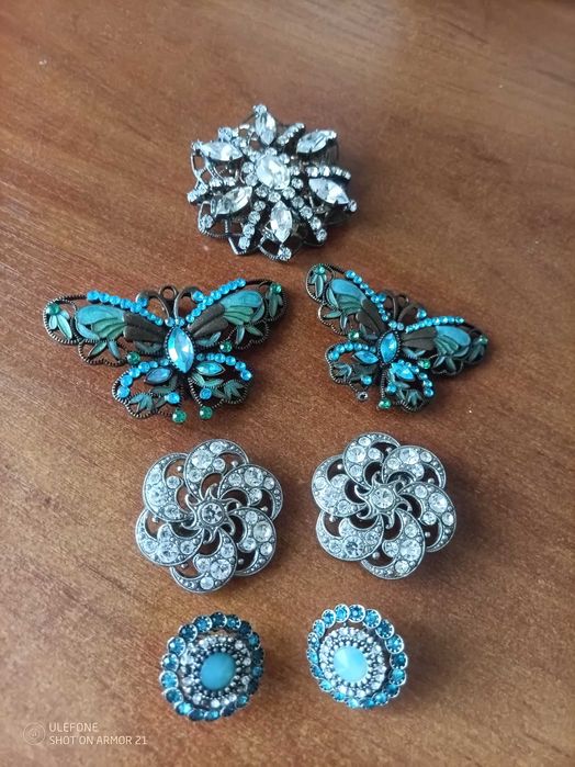 Антикварні брошки