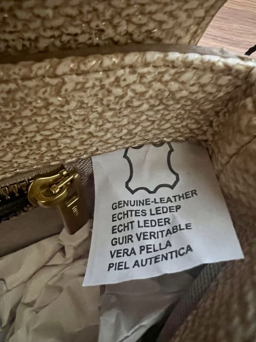 Нові сумки Gucci та miu miu.