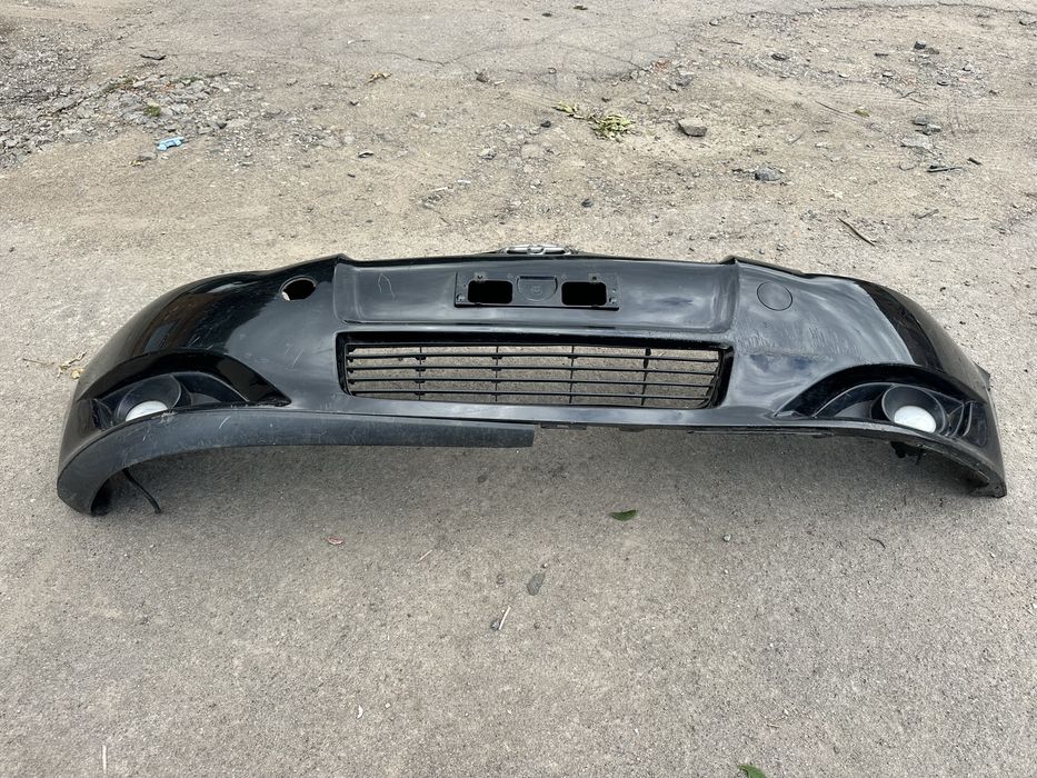 Передній бампер Toyota Auris E150 Тойота Ауріс Е150 2007-2009