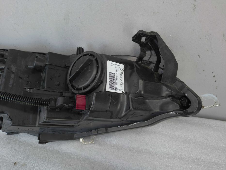 Lampa reflektor Lewy Opel Astra J IV