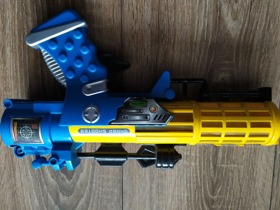 Pistolet plastikowy Flash Gun zabawka 3+ błyska strzela
