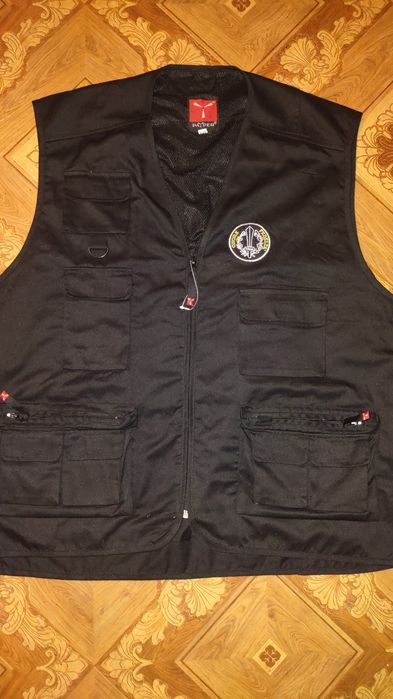 Продам охотничью мужскую жилетку