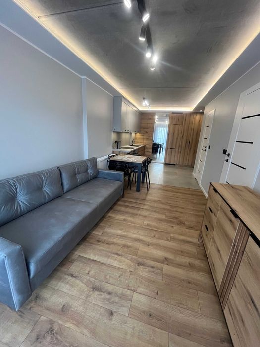 Do wynajęcia nowoczesne mieszkanie 2-pokojowe – 44 m² z balkonem i  2 miejscami postojowym w hali garażowej
