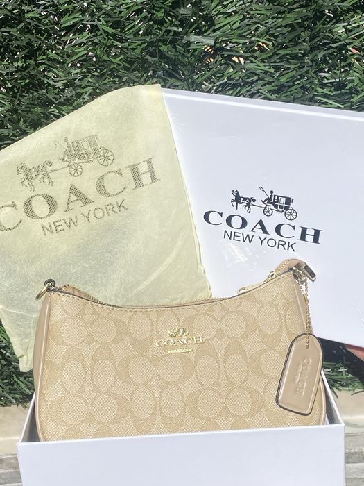 Mala Coach Nova, Com caixa.