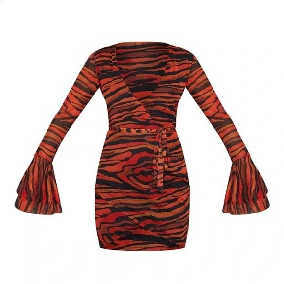 Помаранчева сукня з принтом зебри