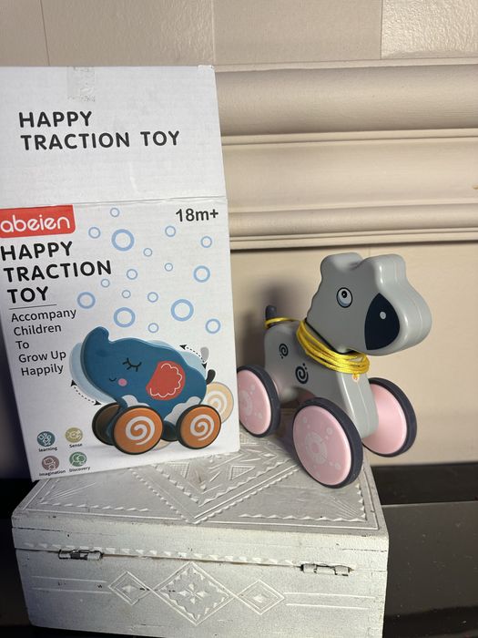 Іграшка каталка