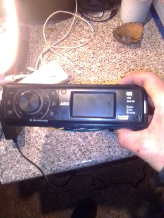 PSP 2, tablet para ver fotos e um radio