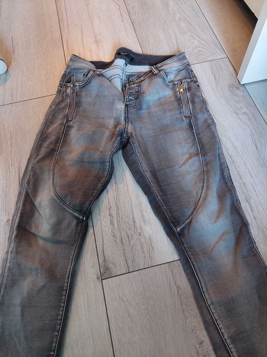 Spodnie jeansowe damskie toxik szare zwężane rozciągliwe rozmiar 38