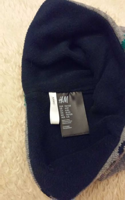 Czapka z nausznikami H&M dinozaury 110 - 128 cm. na 4 - 8 lat