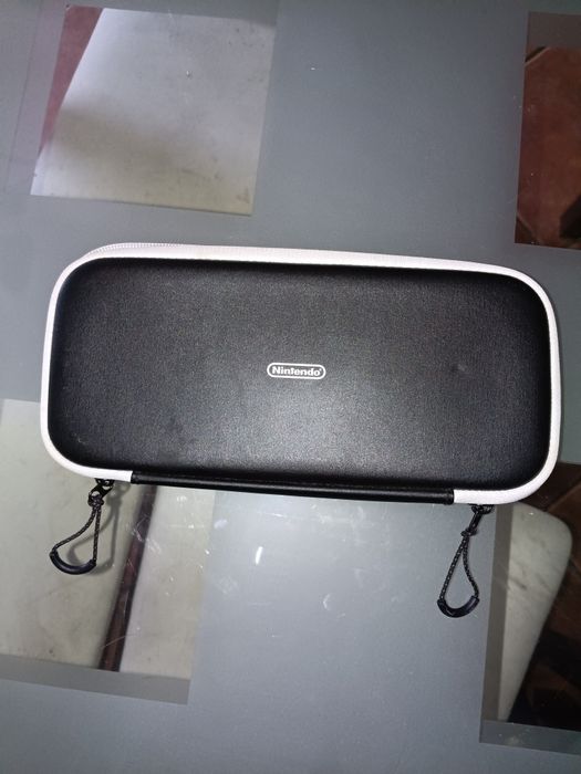 Nintendo Switch Oled Como Nova Com Quatro Jogos De Oferta