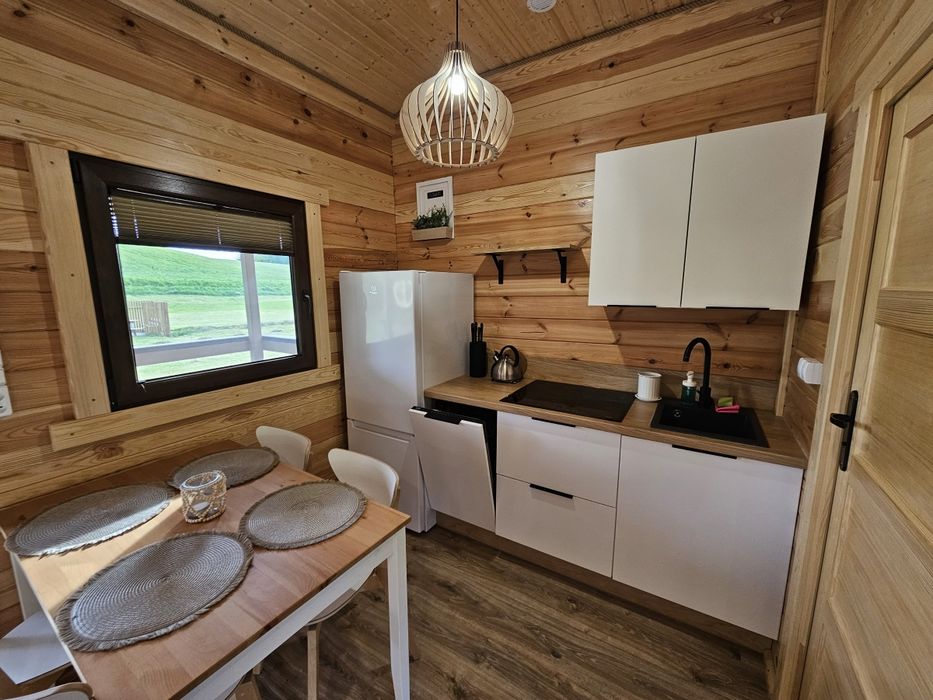 Domki letniskowe Przy Leśniczówce - Sauna - Jacuzzi - Domki nad jeziorem- Bory Tucholskie- Kaszuby, rodzinny wypoczynek, plac zabaw, stawy