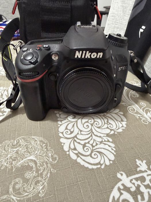 Máquina fotográfica Nikon D7100 + lente