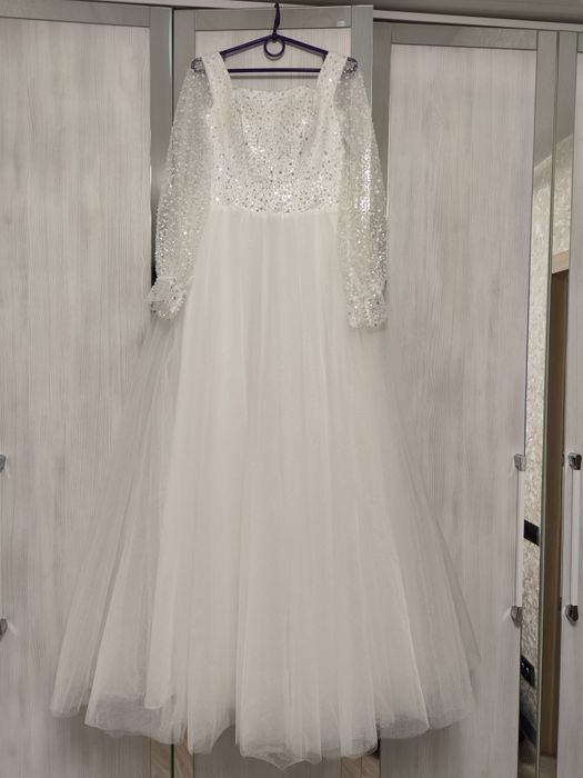 Ніжна весільна сукня