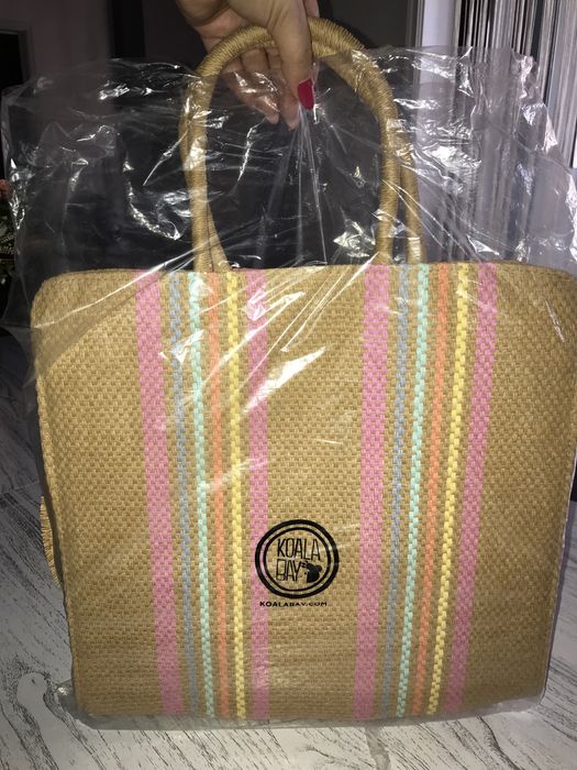 chapéu e mala de praia