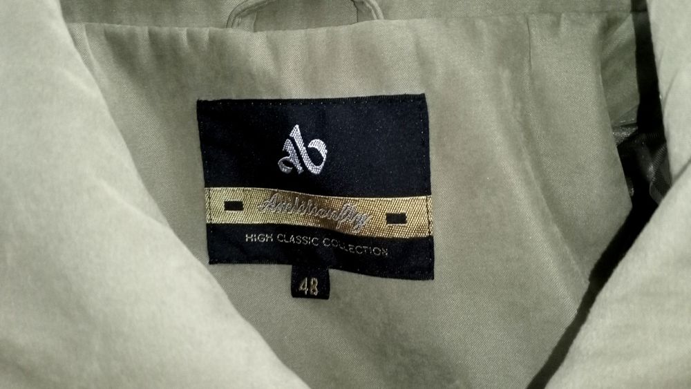 Płaszcz przejściowy wioseny klasyczny suwaki kieszenie odcień ziemisty