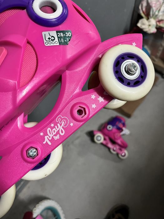 Patins em linha rosa
